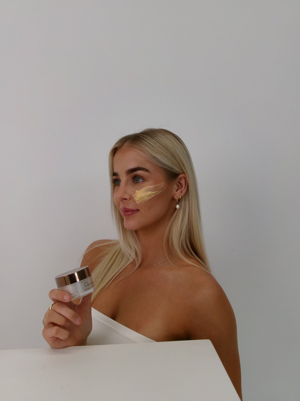 Client receiving a calming facial treatment for rosacea at The Skin Suite Collective, supporting skin barrier health and reducing redness.